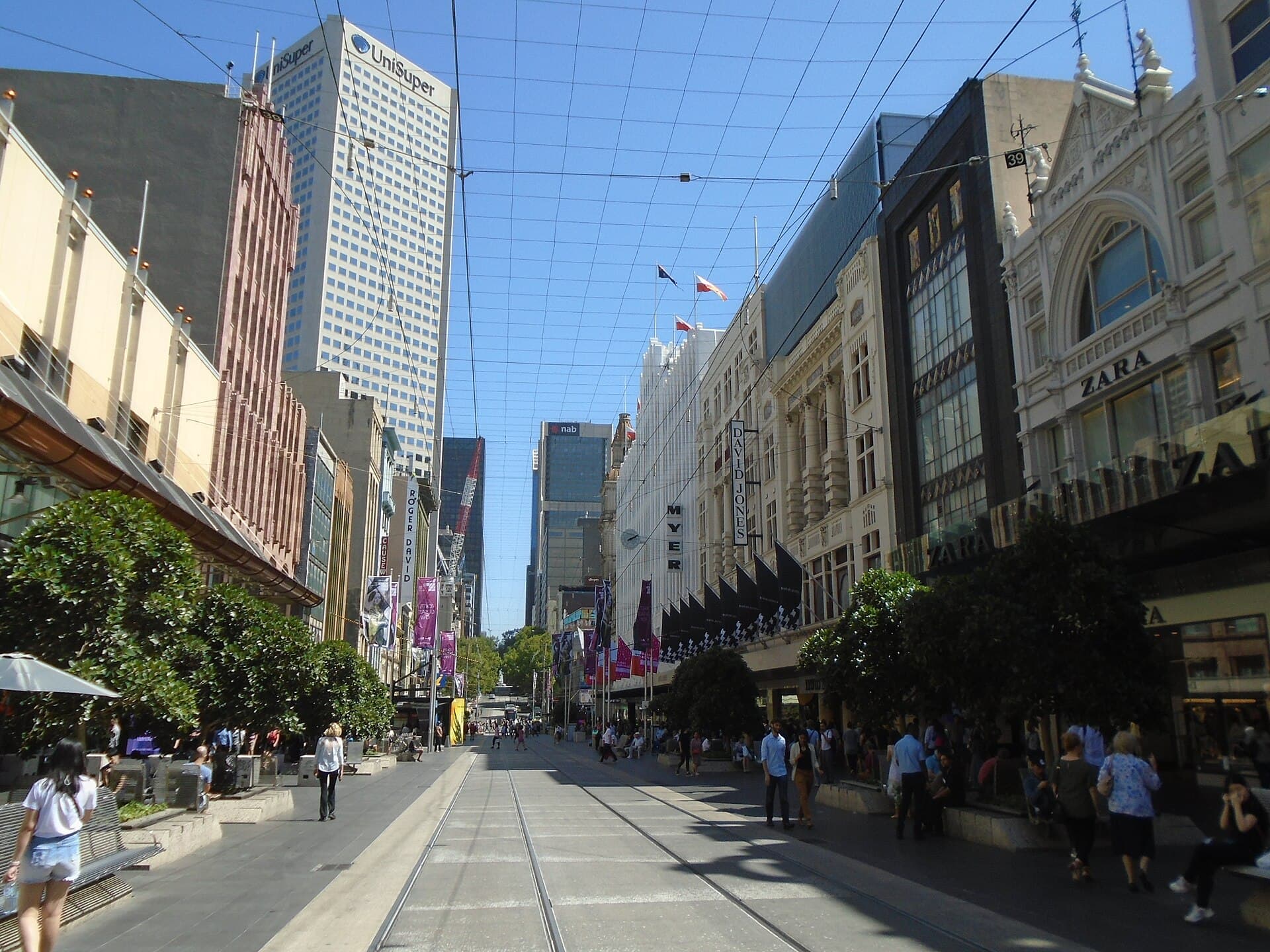 Trams and pedestrians on Bourke Street in Melbourne